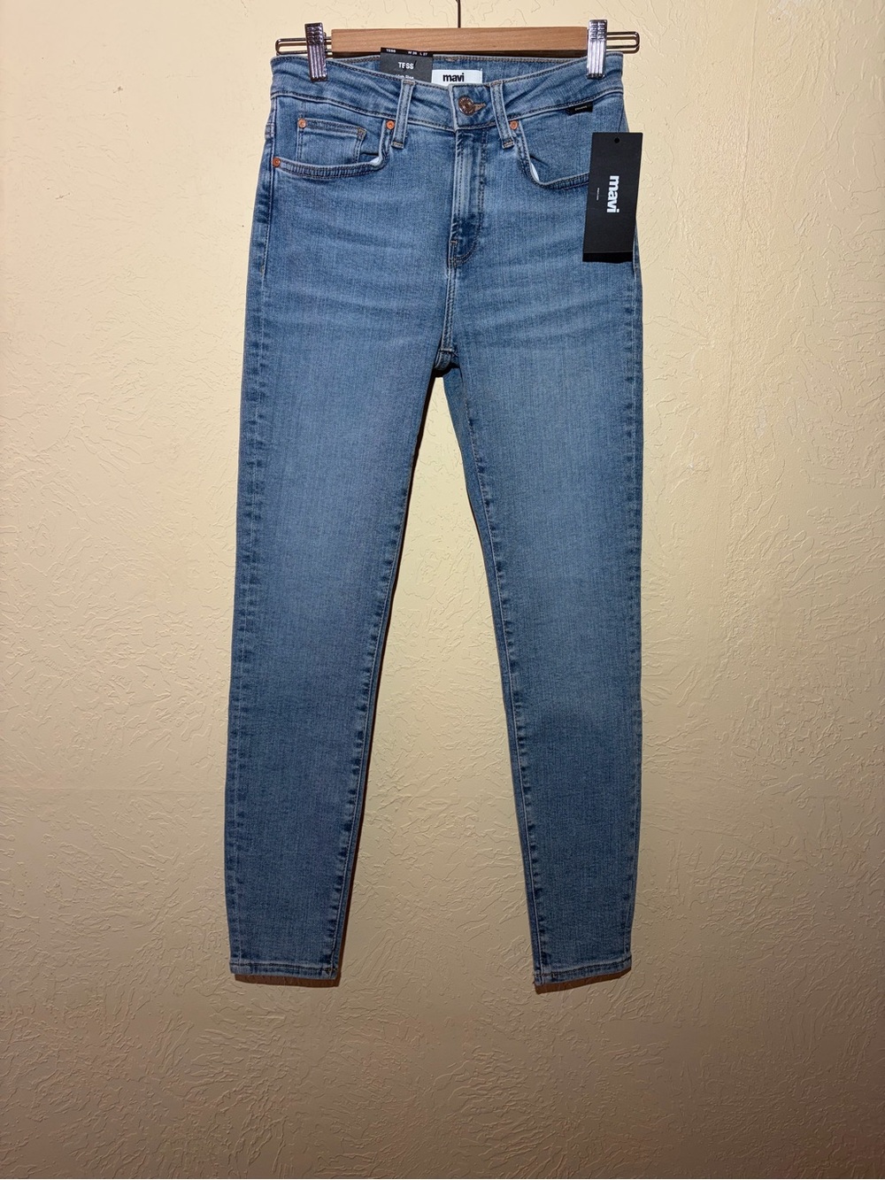 Mavi Tess High Rise Skinny Jeans in a medium blue wash.